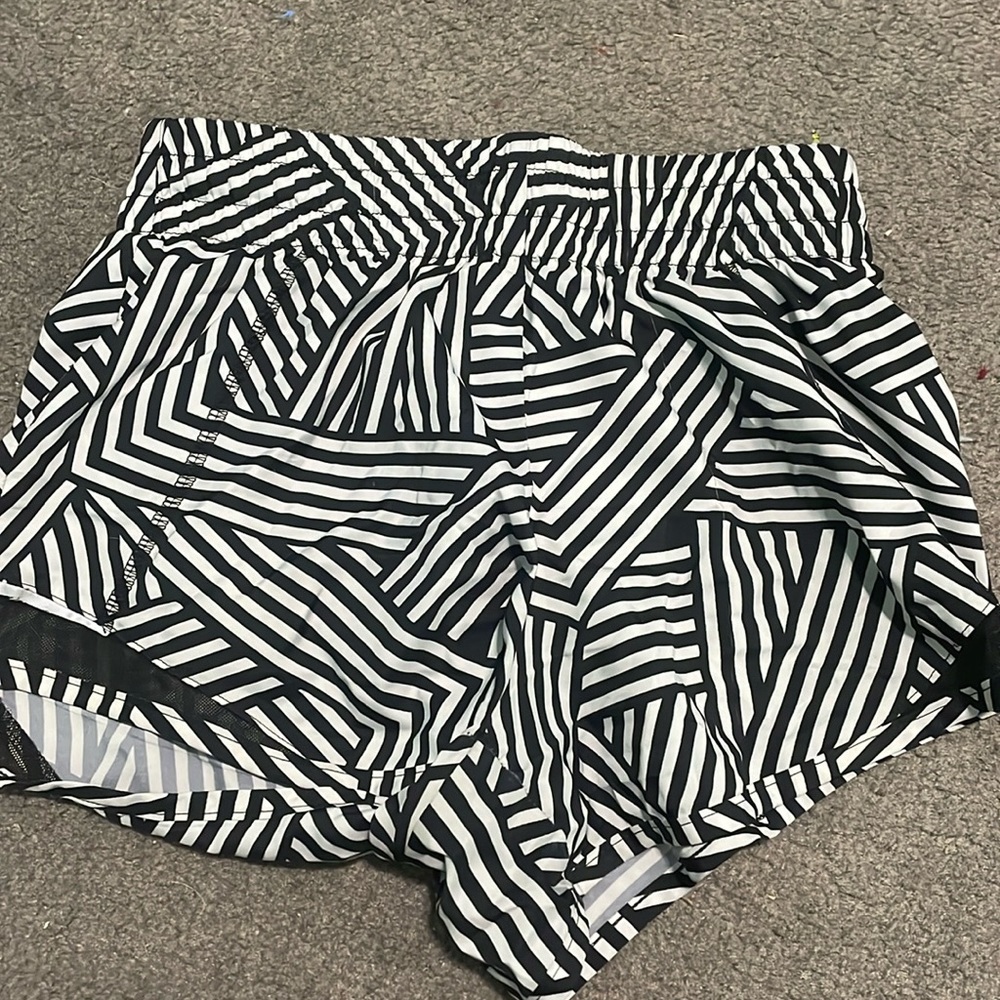 Kids black and white striped athletic shorts